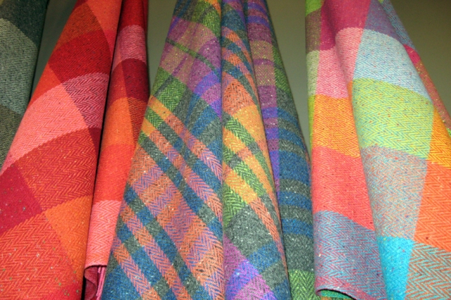 The range of shawls, sweaters, caps -- in the most gorgeous colors! These are shawls in Avoca, a Dublin shop